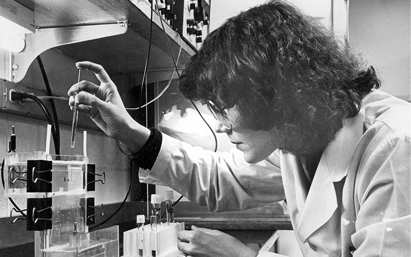 p30-35-big-story-technician-nanette-fishman-uses-a-needle-to-put-protein-sample-getty-161991309.png