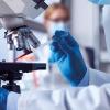 Two Scientist Microscope images and video- istock-1363238207